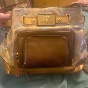 Selling. To make room. Barely used. Sharif handbag